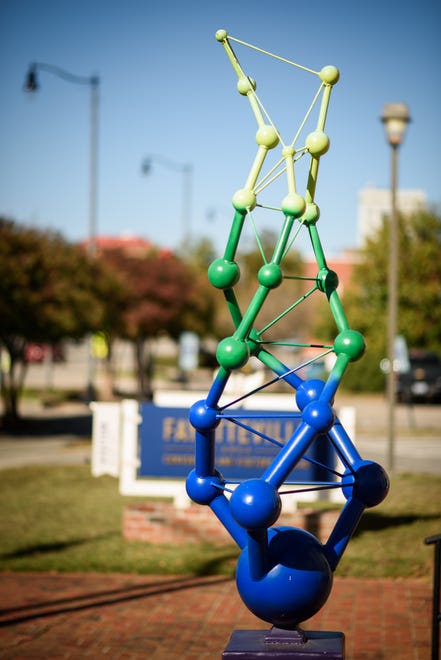 “Particle” by Christian Happel is located in front of the Fayetteville Area Convention & Visitors Bureau on Person Street. This piece is part of the ArtScape 7 public art display put on by The Arts Council of Fayetteville/Cumberland County.