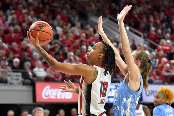 N.C State's Aziaha James (10) attempts the layup against North Carolina's Lexi Donarski (20) during the second half. The N.C. State Wolfpack and the North Carolina Tar Heels met in a regular-season game in Raleigh, N.C., on Feb. 1, 2024.