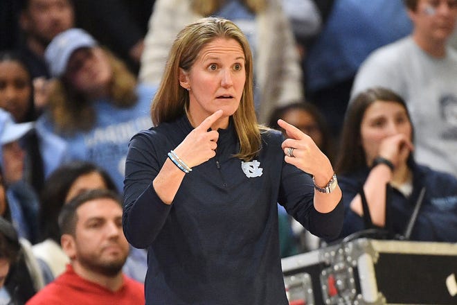 North Carolina head coach Courtney Banghart gives direction to her team against N.C. State late in the fourth quarter. The N.C. State Wolfpack and the North Carolina Tar Heels met in a regular-season game in Raleigh, N.C., on Feb. 1, 2024.