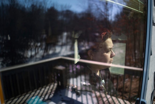 February 22, 2024: Courtney Cirone, 41, of Marion stands outside of her home in northern Michigan where she developed a fungal disease caused by spores that are endemic in the Great Lakes region called blastomycosis and a similar fungal disease from nature, histoplasmosis. Some people breathe in these spores and are fine or some may contract cold or flu-like symptoms and get better in short order. But for others, it can be far more serious, and affect organs, bones, and especially lungs.
