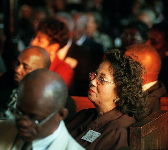 Lucille Robinson and other members of the AME Zion Church listen as Bishop George E. Battle Jr. preaches during the Central North Carolina Conference at Evans Metropolitan AME Zion Church in Fayetteville on Nov. 9, 1999.