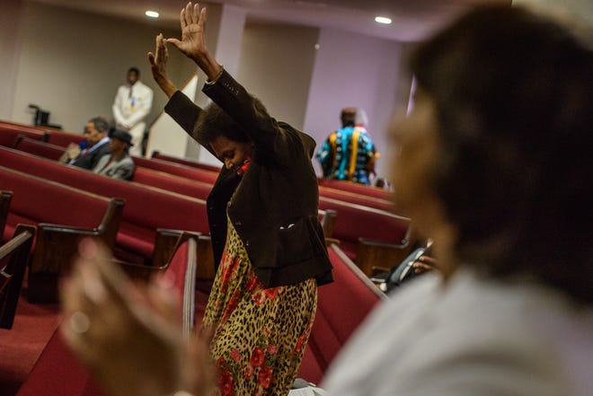 Lewis Chapel Missionary Baptist Church member Peggy Levy-Green dances during a musical selection Sunday April 23, 2017 during the Mother of the Year crowning for the Fayetteville branch of the NAACP.