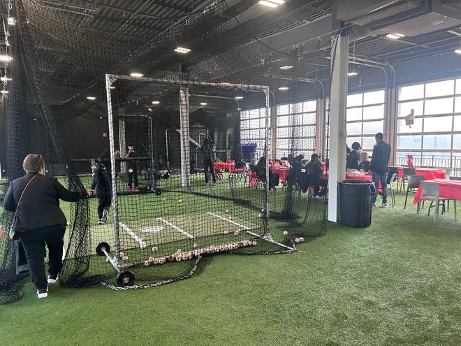 Attendees of the 3rd annual It's a Family Affair Sneaker Ball event enjoy snacks and games inside Segra Stadium, Mar. 2, 2024.
