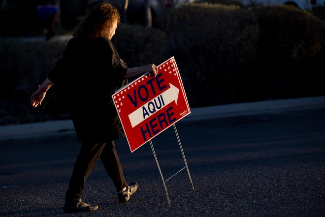 March 5, 2024 : A "Vote Here" sign is put up by an Election Official outside the El Paso County Tax Office- Eastside Annex voting polls in El Paso during Primary Election Day in Texas.