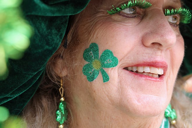 March 10, 2024: Janet Galante, of Ocean Breeze, enjoys the Jensen Beach Chamber of Commerce annual St. Patrick’s Day Parade in downtown Jensen Beach, Florida.