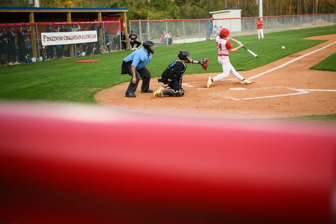 Freedom Christian Academy plays their first game on their new baseball field against St. Pauls on Thursday, March 14, 2024.