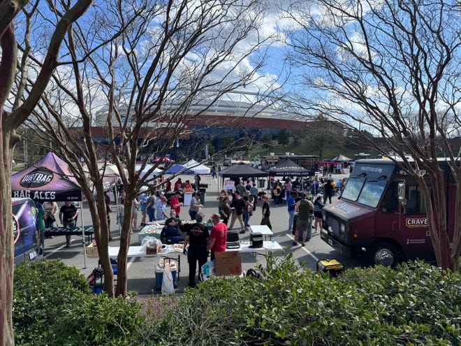 A view of food trucks and tents from the parking lot of Crown Coliseum during the Fayetteville Eats Food Festival, March 16, 2024.