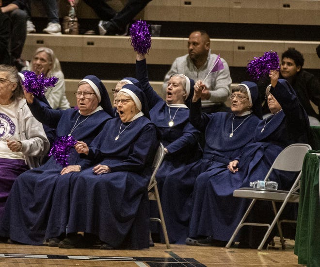 March 16, 2024 : Fans of Catholic Central High School from Latham, N.Y. cheer their team during the New York State Girls Basketball Championships in Troy, N.Y. Catholic Central captured the state title with a 64-62 win over Walter Panas of Westchester County, N.Y.