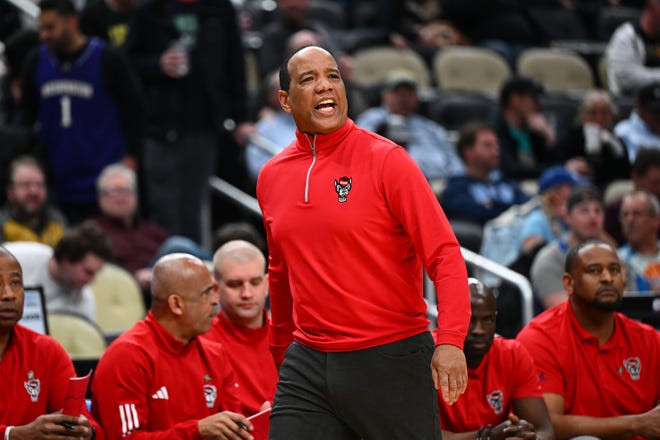 NC State head basketball coach Kevin Keatts reacts during the first half of a game against the Texas Tech in the first round of the NCAA Men's Basketball Tournament, Thursday, March 21, 2024, at PPG PAINTS Arena in Pittsburgh, Pennsylvania.