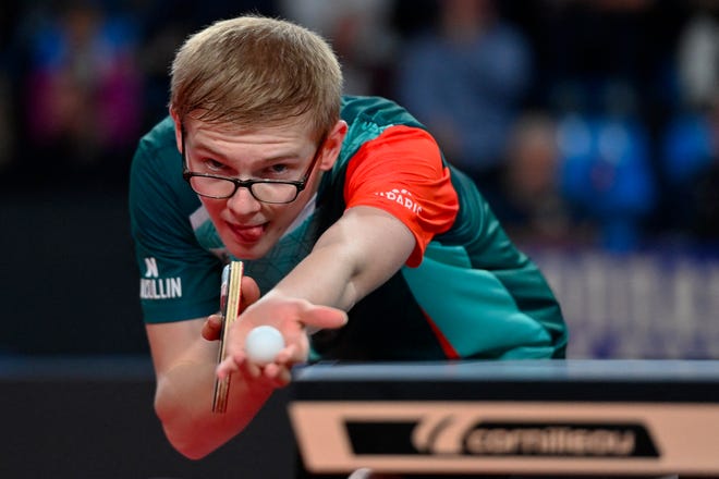 March 24, 2024 : French Felix Lebrun serves to French Simon Gauzy during the men's single semi-final table tennis match in the France 2024 Championship at FDI Stadium in Montpellier, southern France.