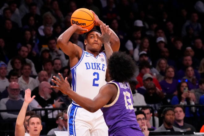 Mar 24, 2024; Brooklyn, NY, USA; Duke Blue Devils guard Jaylen Blakes (2) shoots the ball on James Madison Dukes guard Michael Green III (13) in the second round of the 2024 NCAA Tournament at Barclays Center. Mandatory Credit: Robert Deutsch-USA TODAY Sports