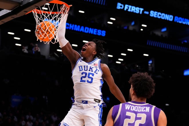Mar 24, 2024; Brooklyn, NY, USA; Duke Blue Devils forward Mark Mitchell (25) dunks the ball against the James Madison Dukes in the second round of the 2024 NCAA Tournament at Barclays Center. Mandatory Credit: Robert Deutsch-USA TODAY Sports