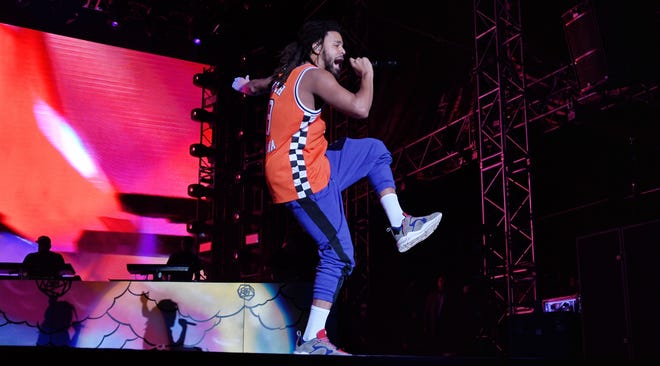J. Cole performs at his inaugural Dreamville Festival at Raleigh's Dix Park on Saturday night. [Scott Sharpe/The News & Observer]