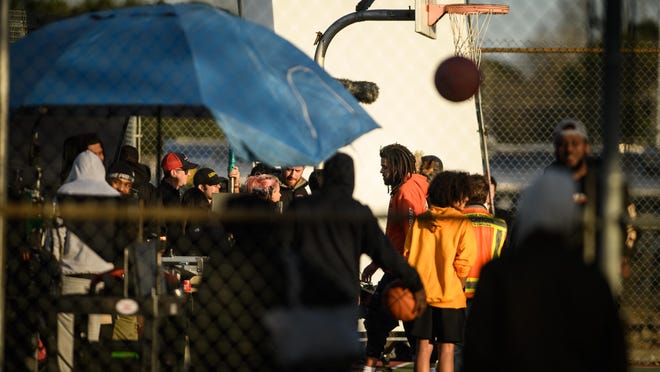 J. Cole filming a project on a basketball court near Walker-Spivey Elementary School on Thursday, Jan. 9, 2020.